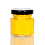 Round Transparent 100ml Glass Jars for Honey Storage Food Packaging with Metal Lids for sale