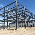 Durable Commercial Steel Framed Workshop Buildings With Welded Connection / Rolled Up Door for sale