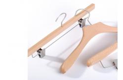 China Natural Lotus Wood Clothing Store Hangers With Clips For Displaying Pants supplier