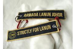 China 2.5cm 3D Gold Embroidery Logo Keychains supplier
