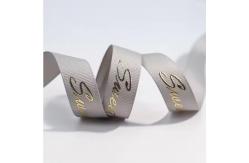 China Customized Grey Shiny 3D Foil Printing Polyester Grosgrain Ribbon for Gift Packaging supplier