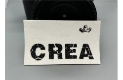 China Good Washable White Microfiber Screen Printed Patches With Matte Silicone Logo supplier