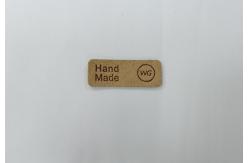China Embossed Logo Microfiber PU Leather Patches Washable Labels Sew On Clothing supplier