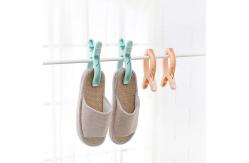 China 4 Pcs 1 Set Spring Peg Beach Towel Quilt Plastic Clothes Hanger Clips supplier