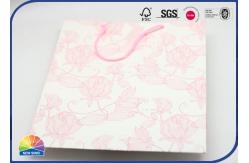 China Customized Size Logo Eco Friendly Folding Coated Paper Bag With Handle supplier