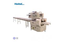 China 50 pcs medical surgical non woven mask automatic flow bag packing machine supplier