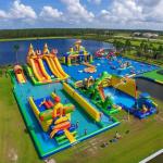 Land Inflatable Water Park With Big Slides And Floating Toys for sale