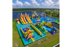 China Land Inflatable Water Park With Big Slides And Floating Toys supplier