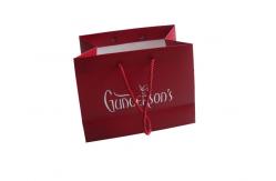 China Promotional Custom Printed Red Paper Bags Gift Package With Cotton Handle Rope supplier