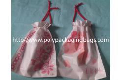 China Small Recyclable White Plastic Drawstring Bags with Flower Printed For Underwear supplier