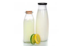 China Recyclable Glass Milk Jug Bottle 500ml With Straw Hole Aluminum Lid supplier