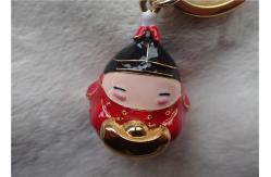 China Chinese Style Ceramic Fat Baby Gold Ingot Key Chain In Red Coat supplier
