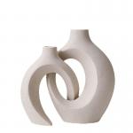 Embrace Hollow Ceramic Vase for Modern Home Decor for sale