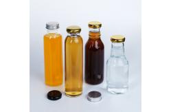 China Transparent Bulk Glass Juice Bottles 2 Oz 300ml for Soft Drink supplier
