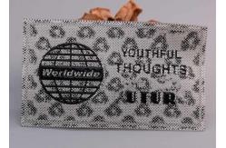 China Printed With Black Shiny Logos Custom Silicone Labels For Clothing supplier