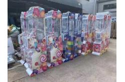 China Dreamland Hardware Coin Operated Lucky Claw Games Cheap Mini Toy Claw Crane Machine supplier