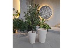 China Cream Composite Clay Flower Pot with Smooth Hand Carved Design supplier