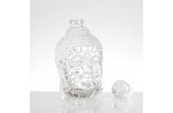China Unique Buddha Head Shaped Glass Bottles with Aluminum Plastic PP Collar Material supplier
