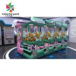 China Mini Toy Crane Machine For 4 Players Boutique Vending Machine Coin Operated for sale