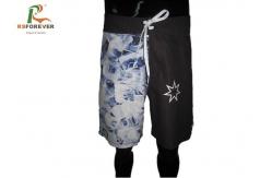 China Stylish Printed Board Shorts Custom Logo Mens Swim Trunks 4 Way Stretch supplier