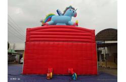 China Rainbow Horse Two Parallel Channels Inflatable Slides With Candy Shaped Pillars supplier
