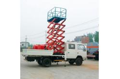 China 14m Lifting Height Mobile Truck Mounted Scissor Lift with 450kg Loading Capacity supplier