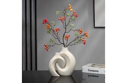 China Embrace Hollow Ceramic Vase for Modern Home Decor supplier