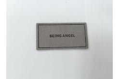 China Microfiber Embossed Logo PU Leather Label Sew On Clothing Customize Design supplier