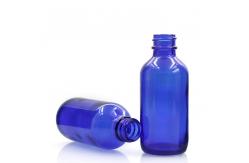 China Round ODM Boston Glass Bottles 2 Oz Blue Glass Spray Bottles supplier