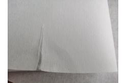 China Gaoxin 100% Polyester Backing Paper Cutaway Adhesive Stabilizer Embroidery Interlining supplier