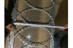 China 500mm Coil Diameter Flat Rape Coils Razor Wire To Security Fence supplier