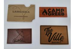 China Customized Design PU Leather Patches Garment Labels Embossed Logo supplier