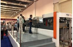 China PLC Paper Cardboard Foil Stamping Die Cutting Machine 7500s/H supplier