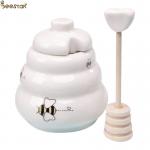 Wholesale White Empty Honey Jar Ceramic Honey Pot with wooden dipper for honey storage for sale