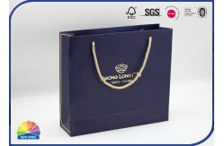 China Personalized Paper Gift Bag With Ribbon Handle CMYK Custom Print Coated Paper Bags supplier