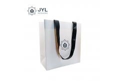 China RoHs Embossing Recycled Paper Gift Bags With Handles Antibacterial Rectangle supplier