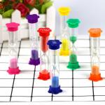 Colorful Plastic Hourglass Timer Flower Shape Base Sand Timer For Kids Education for sale