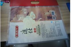 China Matte Suface OPP / NY / PE 5kg Rice Plastic Pouches Packaging With Handle supplier