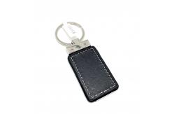 China Classic Leather Keychain Holder With Customized Pattern Packaged In Polybag supplier