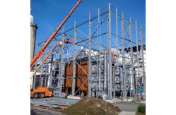 China Customizable Steel Structure Warehouse Building With Rolling Door supplier