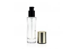 China Cosmetics Packaging 30ml Liquid Foundation Glass Bottle With Pump supplier