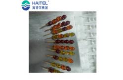 China SUS Food Grade Candy Stick Insert Machine Output 50-60 String Per Min supplier