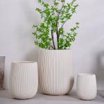 neutral beige round fiber clay planter with vertical lines pattern lightweight durable low-maintainence flower pot holiday Villa hotel shopping mall office decoration garden landscaping project for sale
