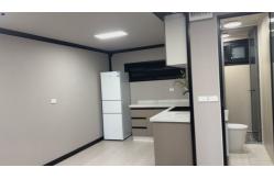 China 20ft Double-wing Expandable Prefab House to Meet the Needs of Temporary Office and Accommodation. supplier