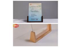 China A4 Clear Desktop Clear Acrylic Photo Frame with Wood Base supplier