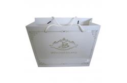 China Order Custom Printed Paper Merchandise Bag Business Packaging Online With Eyelet supplier