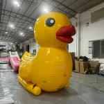 Customized Swimming Inflatable Floating Yellow Duck Airtight Big Inflatable Duck Boats With Seat for sale