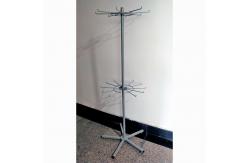 China 2 Layers Rotating Turntable Display Stand With Round Pegs supplier