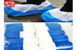 China Disposable Waterproof Half Laminated CPE Shoe Cover 8g 8.5g supplier