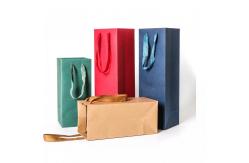 China Recyclable Printed Paper Carrier Bags With Paper Twist Handle supplier
